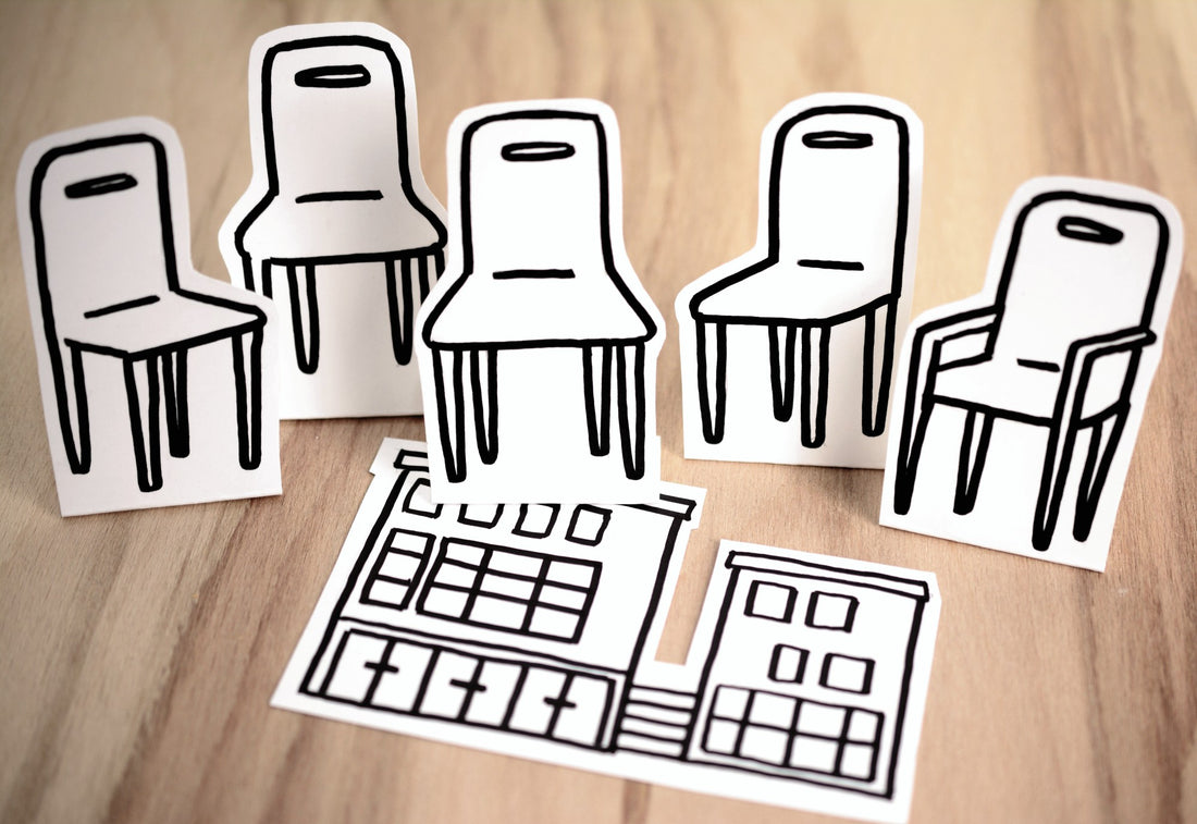 Cut out pictures of chairs and a house