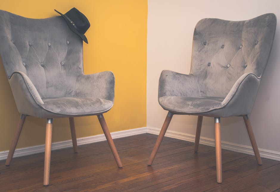 Two chairs that are about to be rupholstered using high grade Naugahyde vinyl